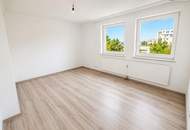 Großzügige 3 bis 4-Zimmer-Wohnung mit Kamin, sonniger Loggia und Stellplatz