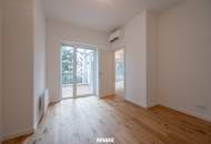 Sanierter Altbau mit modernem Neubau