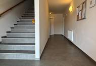 Erdgeschoßwohnung mit eigenem Gartenanteil in zentraler Lage