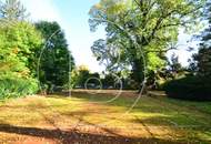 Einfamilienhaus in zentraler Bestlage mit Tennisplatz auf parkähnlichem Grund!