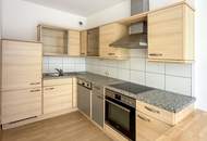 3-Zimmer-Wohnung mit Balkon inkl. Tiefgaragenlpatz + Parkplatz im Freien