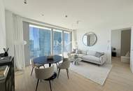 2-Zimmer-Panoramawohnung im 48. Stock mit Abendsonne und Weitblick bis Kahlenberg und Leopoldsberg