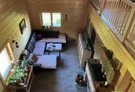 Skandinavisches Blockhaus mit Galerie, Kamin und großem Grundstück mit Fernblick