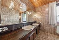 Imposante Landhausstil-Liegenschaft eingebettet in einem idyllischen Gartenparadies mit Schwimmteich und Grünbestand