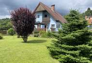 Sonniges Einfamilienhaus mit gepflegtem Garten, Terrasse, Balkon und Doppelgarage