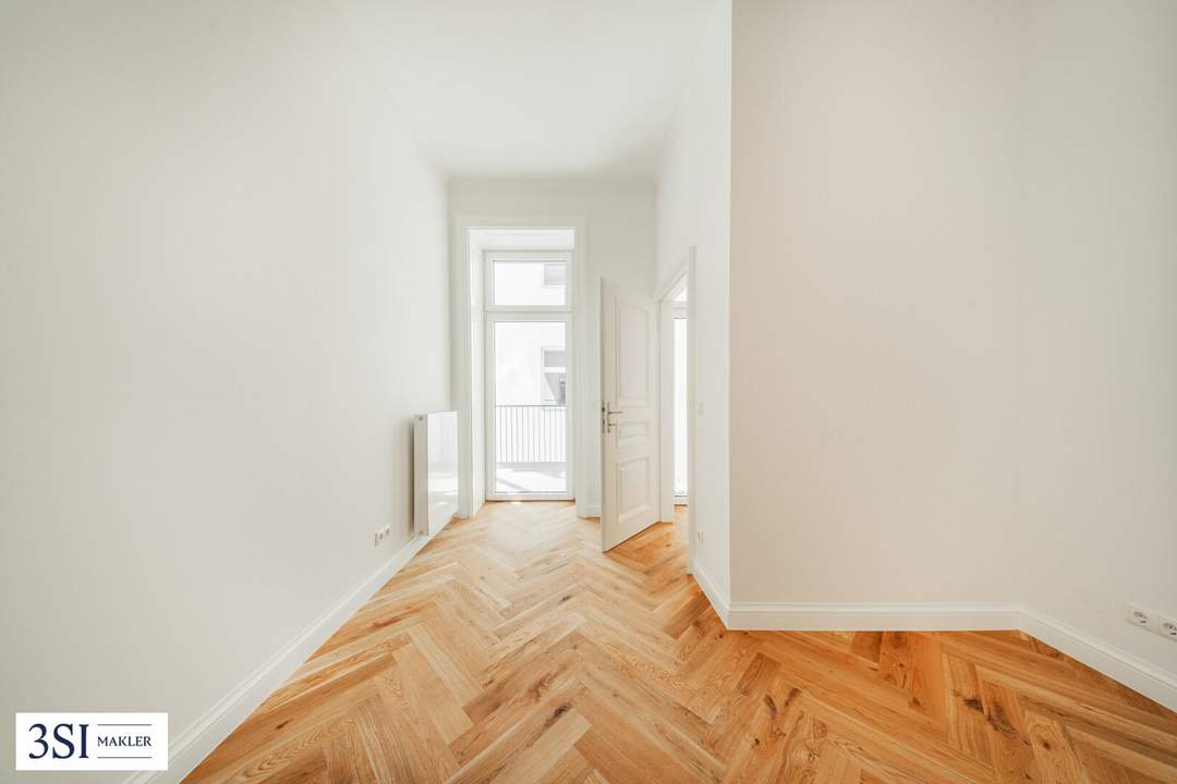 Exquisite Wohnqualität: Frisch sanierter Altbau mit sonnigem Balkon