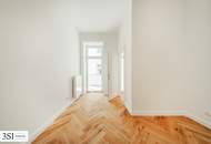 Exquisite Wohnqualität: Frisch sanierter Altbau mit sonnigem Balkon