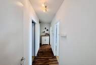 GROßZÜGIGE 5-ZIMMER TERRASSENWOHNUNG MIT 160 m² NUTZFLÄCHE, TIEFGARAGENPLATZ UND FERNBLICK