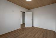 Neuwertige Gartenwohnung mit Terrasse &amp; Tiefgarage