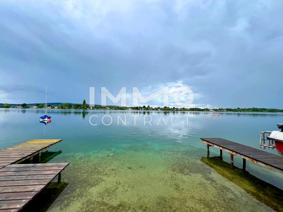 BADEHAUS mit PRIVATSTEG Superädifikat am Neufelder See I > Uferparzelle < NEUE PREISGESTALTUNG!