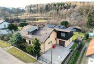 GROSSZÜGIGES EINFAMILIENHAUS MIT TRAUMHAFTEM GARTEN