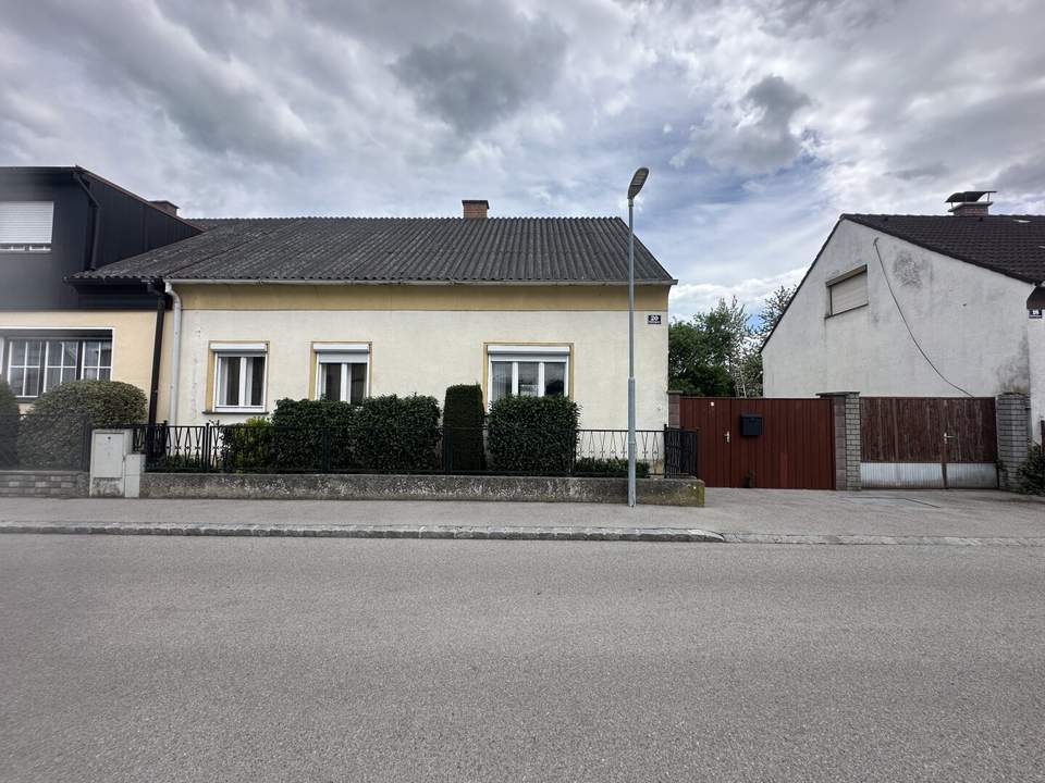 Bungalow mit Garage in zentraler Siedlungslage zu verkaufen