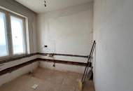 Traumhafte 4-Zimmer Wohnung mit Garten und ausbaubarem Dachgeschoss