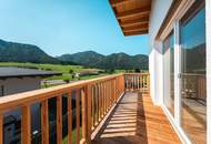 Sonnenverwöhnte Neubauwohnung mit Gartenidylle und Bergblick