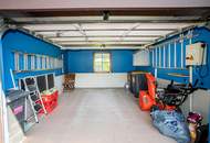 Viel Platz zum Leben – Zweifamilienhaus mit Werkstatt, Party-/ Hobbyraum & zwei Garagen in ruhiger Lage bei St. Wolfgang