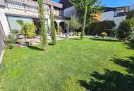 Ruhig und sonnig wohnen: Reihenmittelhaus mit Carport in zentraler Lage!
