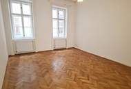 AM GRABEN-NÄHE, 95 m2 Altbau mit Balkon, 2 Zimmer, Komplettküche, Wannenbad, Parketten, 4. Liftstock, Flügeltüren, Spiegelgasse