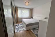 KAUFANBOT liegt vor - Familienfreundliche 4-Zimmer-Wohnung mit Balkon und Garagenplatz