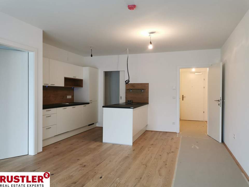 Hofseitig ausgerichtete 2-Zimmer-Wohnung mit großem Balkon und Hochbeet