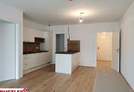 Hofseitig ausgerichtete 2-Zimmer-Wohnung mit großem Balkon und Hochbeet