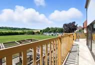 High-end living in a peaceful green location! A feel-good retreat in a class of its own: tradition meets state-of-the-art comfort!