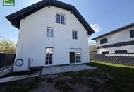 Elegant Wohnen im Grünen! Großzügige Doppelhaushälfte mit Terrassen, Garten und 2 Parkplätzen.