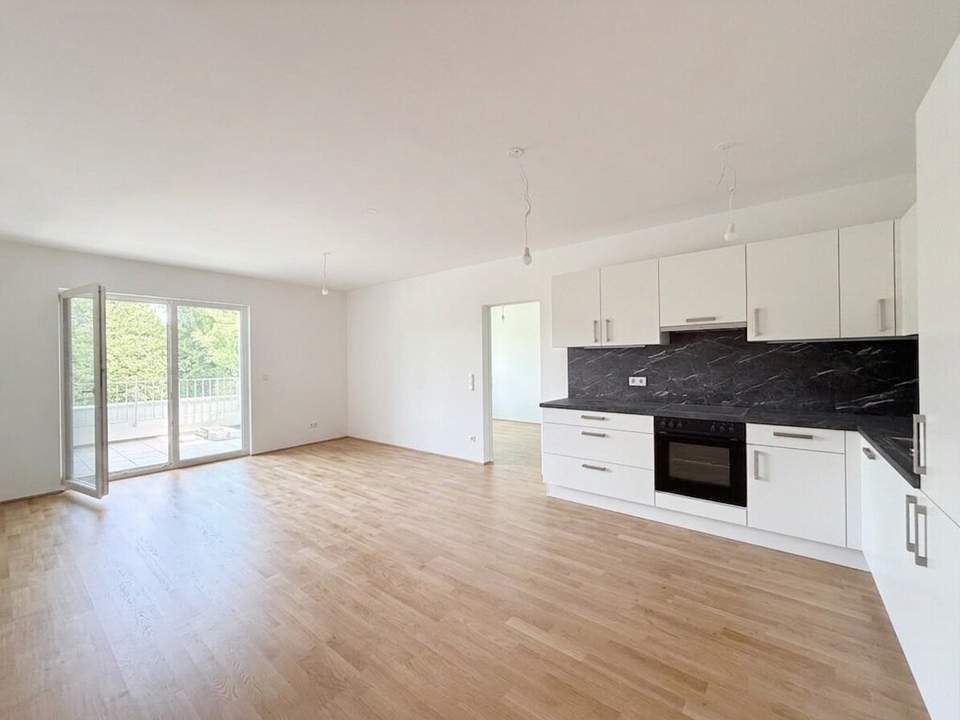 U1 Neulaa! Provisionsfreier Zweizimmer-Erstbezug mit Balkon und Garagenplatz