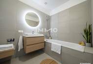 BEIM DONAUUFER: Erstbezug: Klimatisierte Dachgeschosswohnung mit ruhigem Hofbalkon