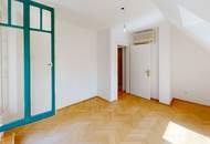 Elegante Dachgeschosswohnung mit Gartenblick, Terrassen und Garage