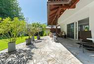 Mehr Raum. Mehr Ruhe. Mehr Ausblick - einzigartige Gartenwohnung mit Pool und Wellnessbereich