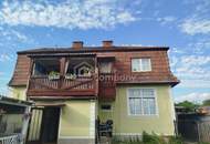 Mehrfamilienhaus mit Gewerbegrundstück