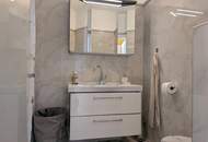 Traumhafte 2-Zimmer-Wohnung mit Penthouse-Flair und Weitblick durch den Wintergarten