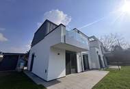 Erstbezug !! Traumhafte Doppelhaushälfte , Wohnkeller mit Garten und 2 Stellplätzen!