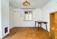 Einfamilienhaus mit Nebengebäude, Doppelgarage und großem Potenzial zur individuellen Gestaltung