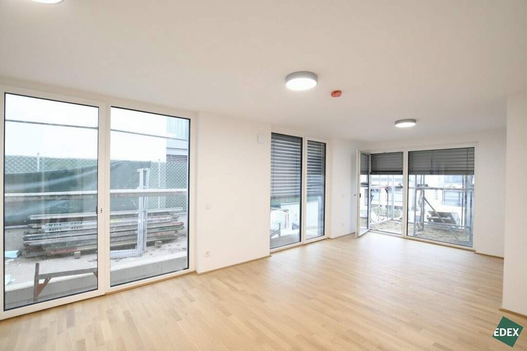 Erstbezug mit Stadtblick: Schöne 3-Zimmer-Wohnung mit Terrasse und moderner Ausstattung