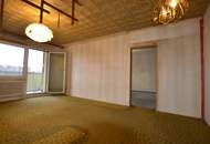 Sanierungsbedürftige 2-Zimmer Wohnung mit sonniger Loggia