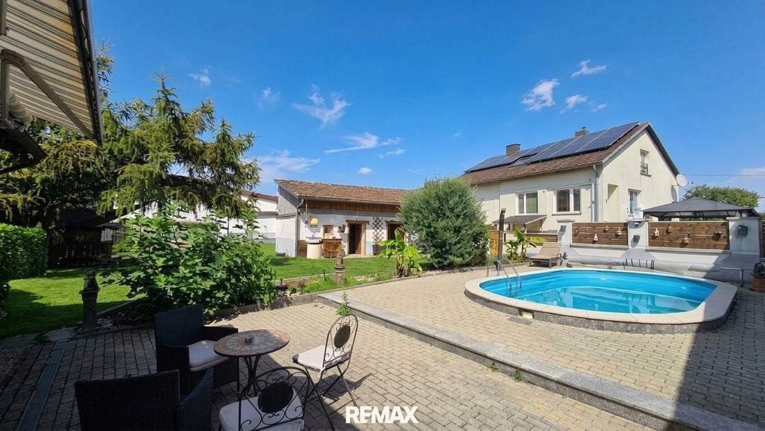Vielseitiges Einfamilienhaus mit Gartenidylle, Swimmingpool, Nebengebäude und Werkstatt!