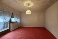 Charmantes Reihenhaus in ruhiger Wohnlage mit 118,70 m² Wohnfläche, voll unterkellert, incl. Garage und traumhaftem Bergblick