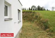 Freistehendes Reihenhaus mit Terrasse, Garten und Carport in ruhiger, grüner Lage