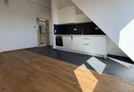 Erstbezug | Sonnige 3-Zi-DG-Wohnung mit Wien-Blick + 8m² Balkon | Klima | Lift
