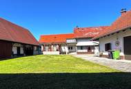 Ehemaliger Bauernhof, Bauernhaus mit Nebengebäuden am Stadtrand.