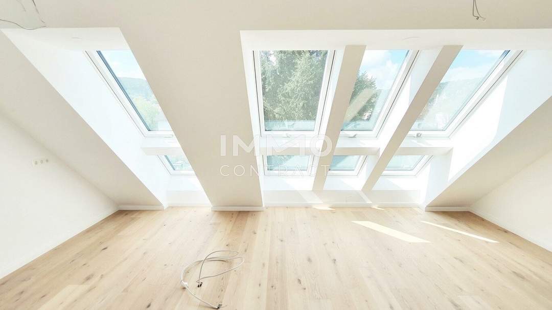 Wohnen auf höchstem Niveau – Einzigartige Dachgeschossresidenz mit Dachterrasse und Panoramablick