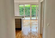 Moderne zentrumsnahe Erdgeschosswohnung mit großem Garten