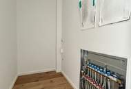 Erstklassige 73.8m² Wohnung mit Balkon in Mannswörth, Perfekt für Erstbezug!