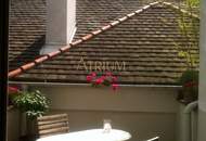 Charmante Maisonette-Wohnung mit Südterrasse und 4% Rendite