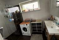 Klimatisierte Neubau-Anlegerwohnung mit 3 Zimmern, 90 m² Garten und 2 Parkplätzen in moderner Siedlung in Wasendorf