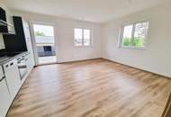 Exklusive 2-Zimmer-Wohnung mit sonniger Süd/West-Terrasse in Jeging