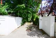 Einfamilienhaus in zentraler Bestlage mit Tennisplatz auf parkähnlichem Grund!