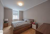 Ab 15.7.26: ruhig gelegene und modern ausgestattete Altbau-Wohnung mit hofseitiger Loggia