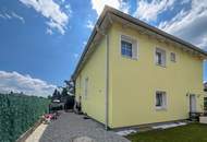 Familienidylle im Grünen: Modernes 6-Zimmer-Haus mit Garten und Anlage